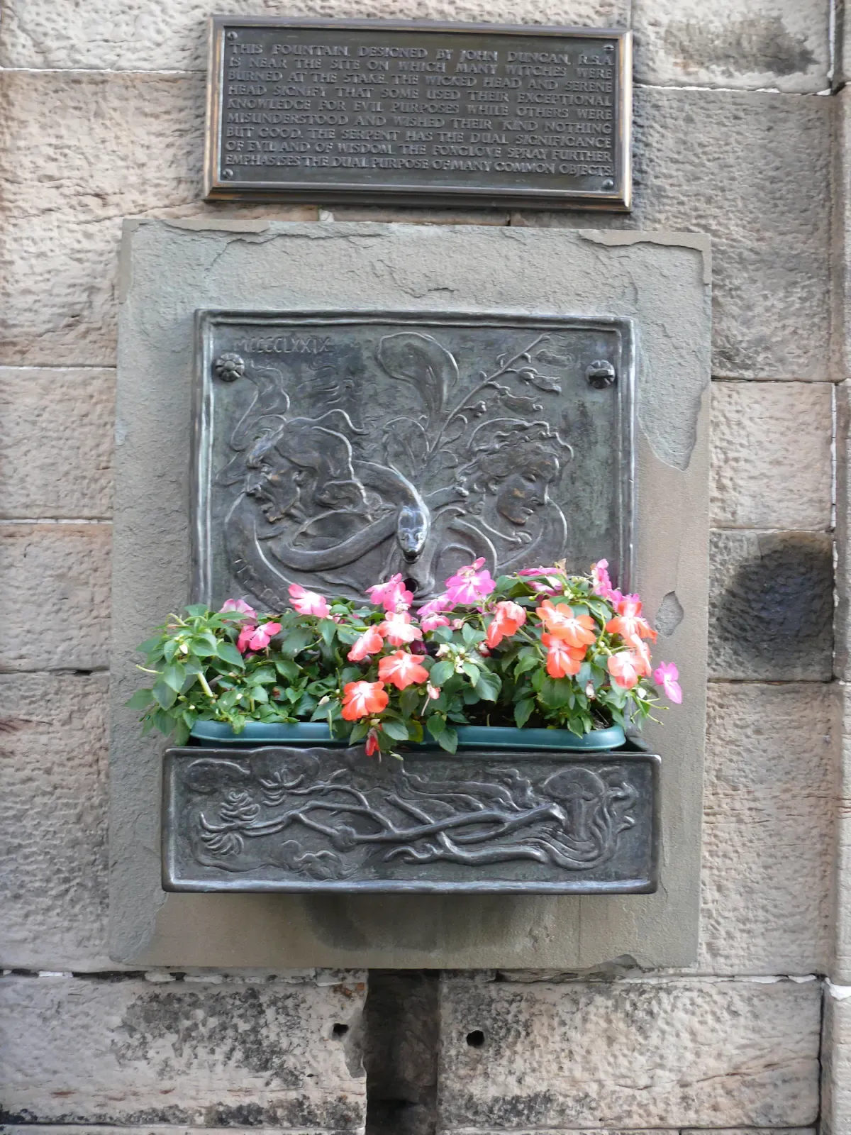 The Witches' Well fountain on Castlehill, a stop for stories of the witch trials on Edinburgh ghost tours, Scotland